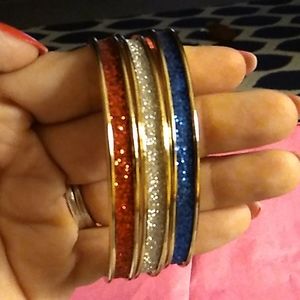 ☆ Three red white and blue bangle bracelets.